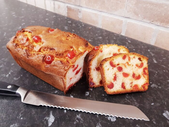 Large madeira loaf cake filled with cherries or fruit