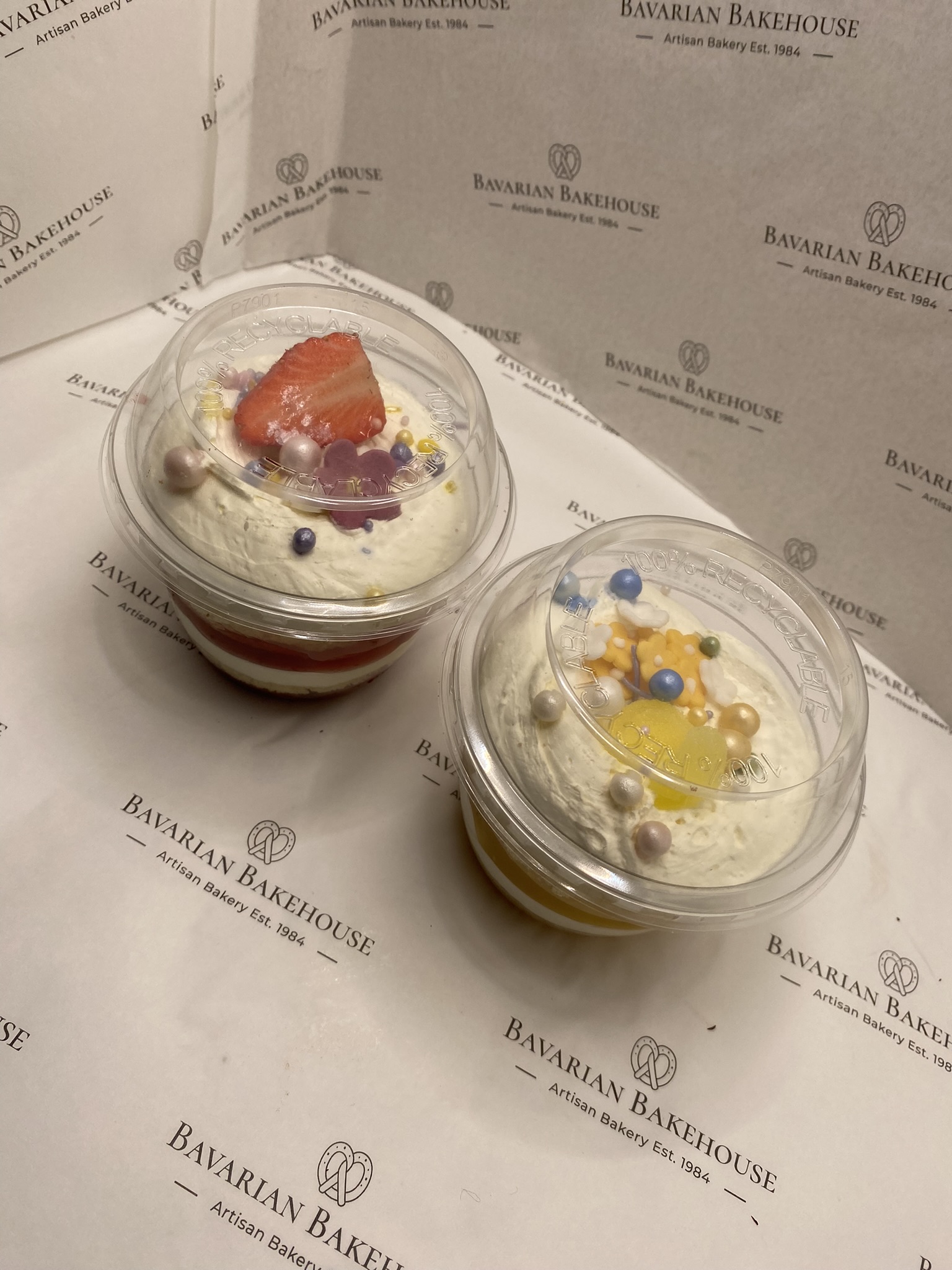 layers of cream, sponge and fruit filling (lemon or strawberry) topped with fruit and sprinkles