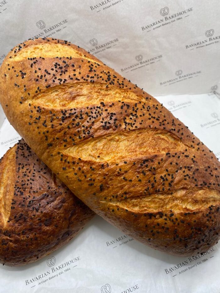 bloomer shaped traditional potato bread soft white bloomer topped with nigella seeds with a rich chewy crust