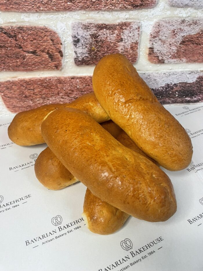 6 inch long sweet and soft brioche hot dog rolls.