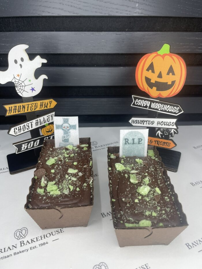 individually baked chocolate brownie topped with fudge frosting, crumbled green mint aero crumbs and an edible rice paper grave stone